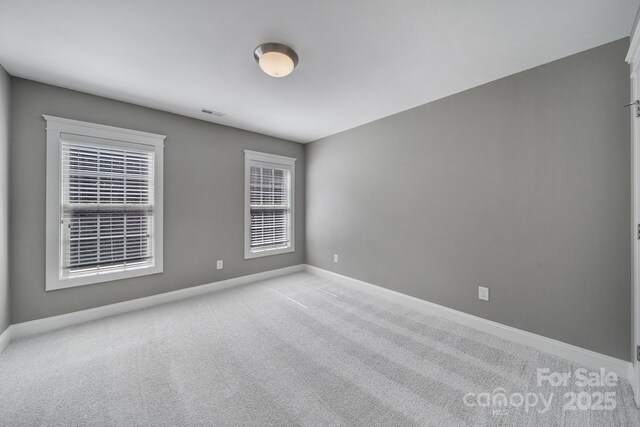 5633 Open Book Ln, Charlotte, NC 28270 - empty room with light carpet and baseboards