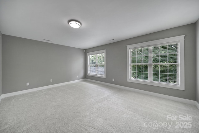 5633 Open Book Ln, Charlotte, NC 28270 - unfurnished room featuring baseboards and light carpet