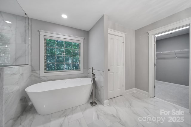 5633 Open Book Ln, Charlotte, NC 28270 - full bathroom with a freestanding bath, a spacious closet, marble finish floors, and recessed lighting