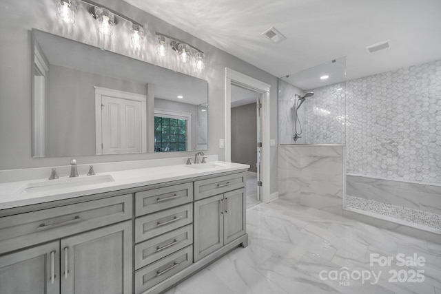 5633 Open Book Ln, Charlotte, NC 28270 - bathroom featuring marble look tiles, a marble finish shower, double vanity, and recessed lighting