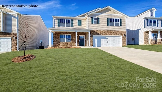 view of front facade with concrete driveway, stone siding, an attached garage, and a front yard