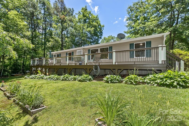 20 Howell Rd, Brevard, NC 28712 - back of house featuring a deck and a lawn