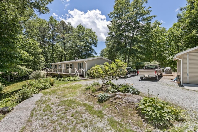 20 Howell Rd, Brevard, NC 28712 - view of yard featuring gravel driveway and a wooden deck