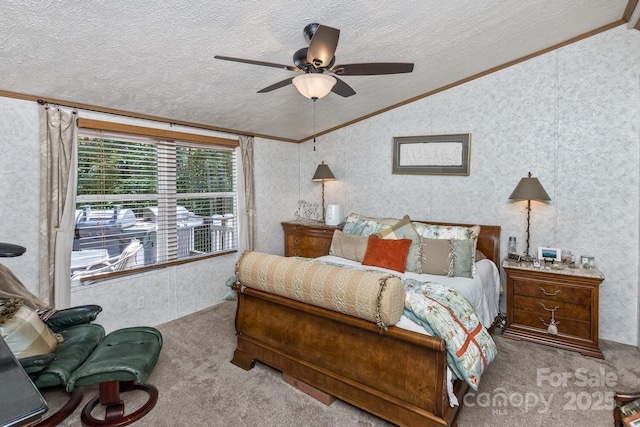 20 Howell Rd, Brevard, NC 28712 - bedroom featuring vaulted ceiling, crown molding, carpet flooring, a textured ceiling, and ceiling fan