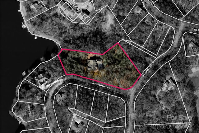 aerial view of property's location featuring property parcel outlined
