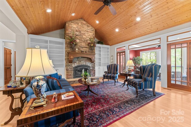 living area featuring recessed lighting, wood finished floors, wooden ceiling, a ceiling fan, and vaulted ceiling