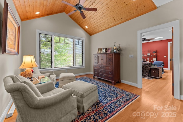 sitting room featuring a ceiling fan, light wood finished floors, wood ceiling, recessed lighting, and baseboards