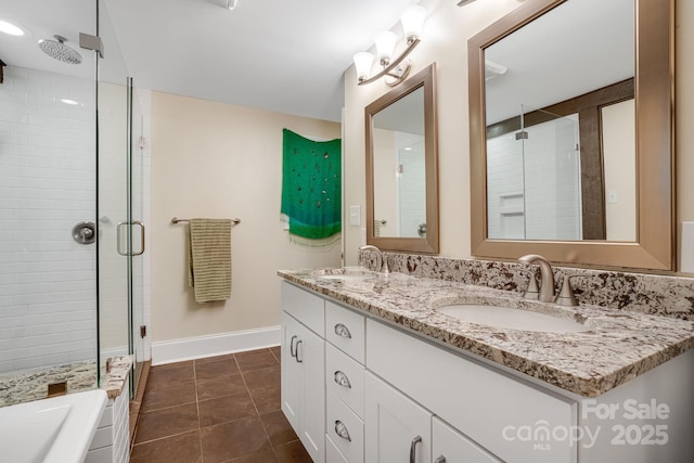 8 Quinn Ct, Asheville, NC 28805 - bathroom featuring a stall shower, double vanity, baseboards, and a tub to relax in