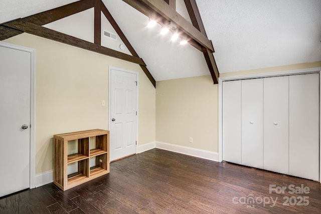 8 Quinn Ct, Asheville, NC 28805 - bonus room with dark wood-type flooring and baseboards