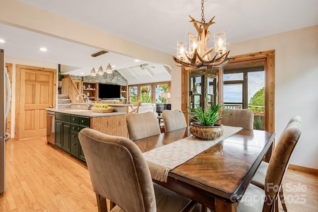 61 Ivy Ridge Rd, Burnsville, NC 28714 - dining area with a chandelier, stairs, light wood finished floors, recessed lighting, and baseboards