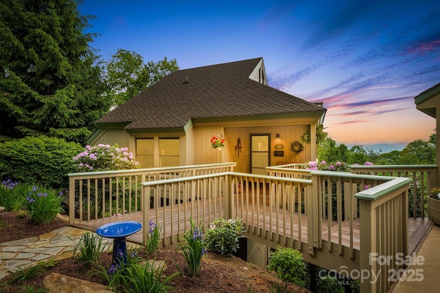 61 Ivy Ridge Rd, Burnsville, NC 28714 - view of front of property with a wooden deck and roof with shingles