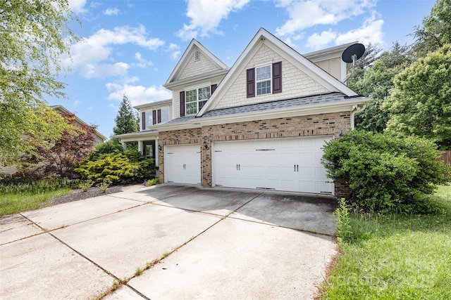 4504 Rockland Ct, High Point, NC 27265 - view of front of property featuring driveway, a garage, and brick siding
