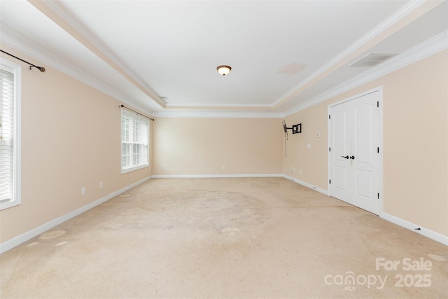 4504 Rockland Ct, High Point, NC 27265 - unfurnished room featuring light colored carpet, a raised ceiling, ornamental molding, and baseboards