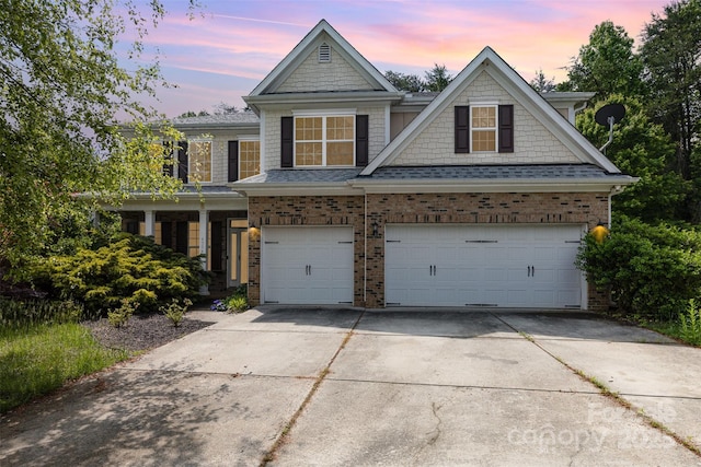 4504 Rockland Ct, High Point, NC 27265 - view of front facade with driveway, an attached garage, and brick siding