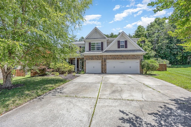4504 Rockland Ct, High Point, NC 27265 - craftsman house featuring concrete driveway, an attached garage, and brick siding