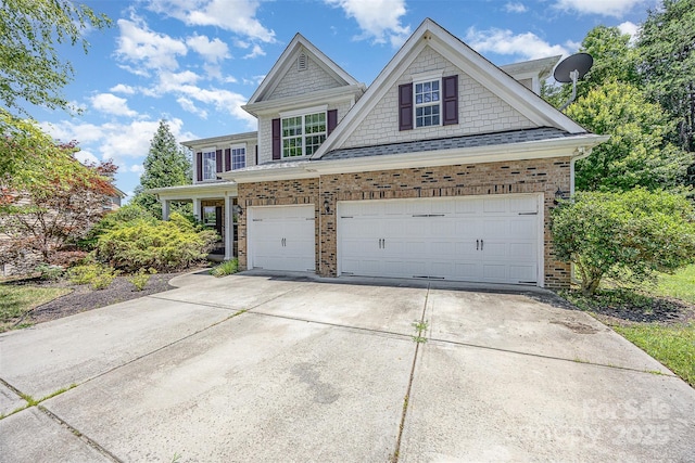 4504 Rockland Ct, High Point, NC 27265 - view of front of house with brick siding, driveway, and a garage