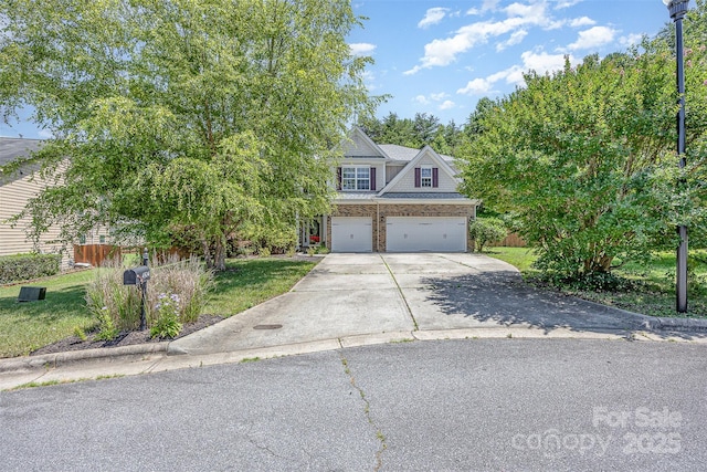 4504 Rockland Ct, High Point, NC 27265 - view of front facade featuring an attached garage, driveway, and a front lawn