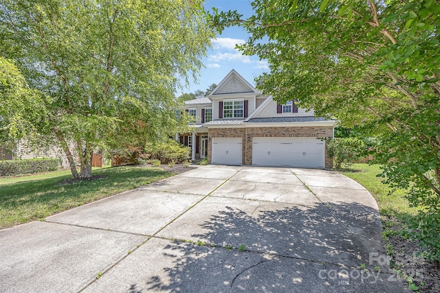 4504 Rockland Ct, High Point, NC 27265 - view of front of home with driveway, a front lawn, and a garage