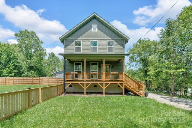 30 Spaulding Dr, Candler, NC 28715 - view of front of home featuring board and batten siding, a porch, and stairway