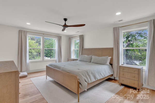 30 Spaulding Dr, Candler, NC 28715 - bedroom with multiple windows, light wood-style floors, recessed lighting, and a ceiling fan