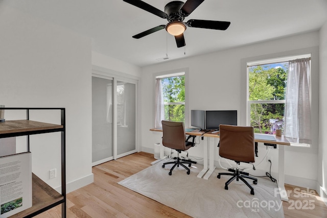 30 Spaulding Dr, Candler, NC 28715 - home office featuring light wood finished floors, baseboards, and ceiling fan