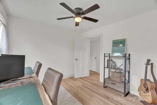 30 Spaulding Dr, Candler, NC 28715 - home office with light wood-style flooring, a ceiling fan, and baseboards