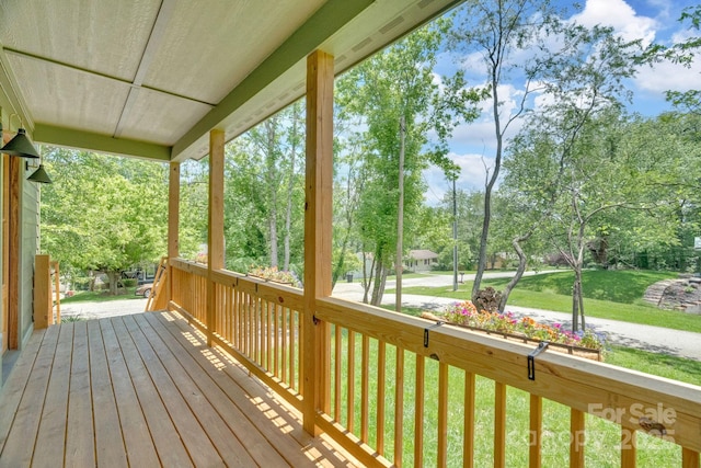 30 Spaulding Dr, Candler, NC 28715 - deck featuring a yard, a porch, and view of wooded area
