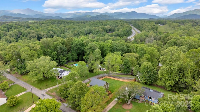 30 Spaulding Dr, Candler, NC 28715 - drone / aerial view of a heavily wooded area and a mountainous background