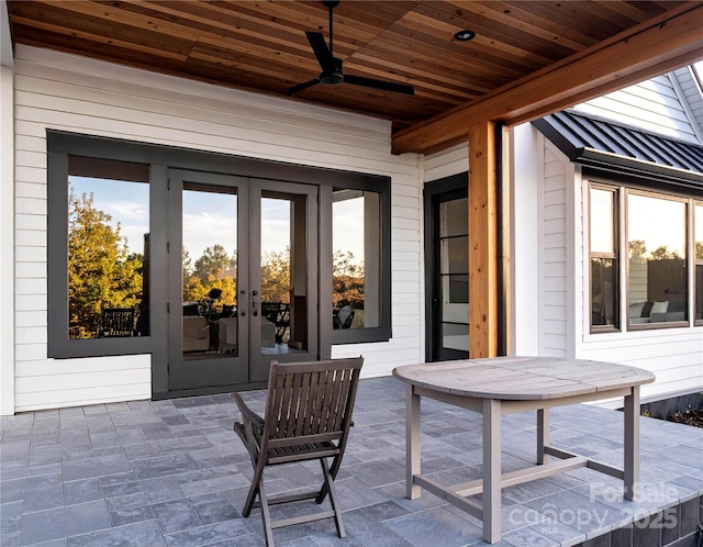 view of patio with french doors and ceiling fan