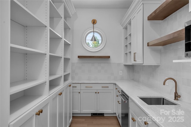 storage area with visible vents and a sink