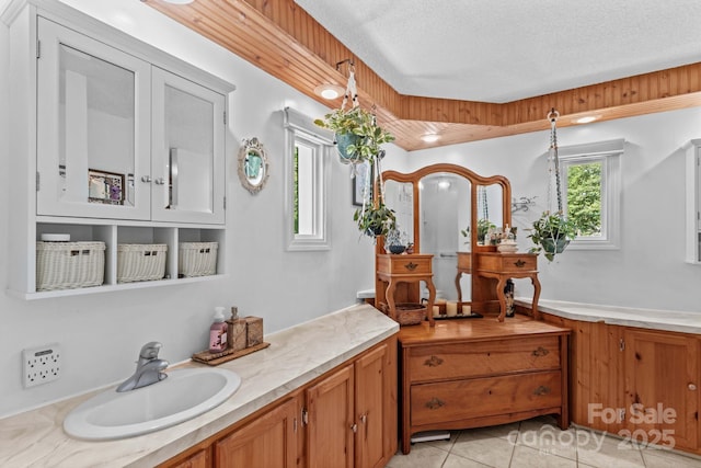 3755 River Rd, Richfield, NC 28137 - bathroom with tile patterned flooring, a textured ceiling, and vanity