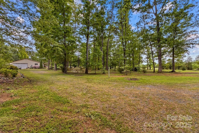 3755 River Rd, Richfield, NC 28137 - view of green lawn featuring a garage