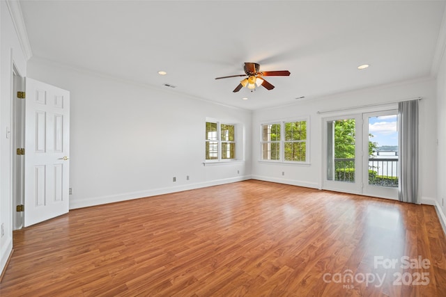 16108 Woolwine Rd, Charlotte, NC 28278 - empty room with ceiling fan, crown molding, light wood finished floors, baseboards, and recessed lighting
