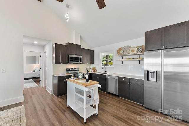 9115 Clement Cir, Terrell, NC 28682 - kitchen with stainless steel appliances, open shelves, ceiling fan, light countertops, and a sink