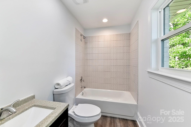 9115 Clement Cir, Terrell, NC 28682 - bathroom featuring vanity, toilet, wood finished floors, shower / tub combination, and recessed lighting