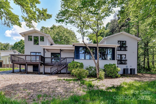 9115 Clement Cir, Terrell, NC 28682 - view of front of home featuring a ceiling fan, stairs, a wooden deck, central AC, and stucco siding