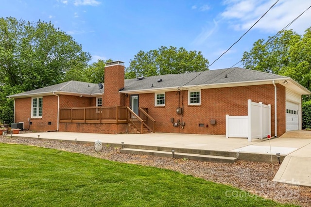 12117 Idlewild Rd, Matthews, NC 28105 - rear view of property featuring brick siding, a lawn, a deck, a patio, and a chimney