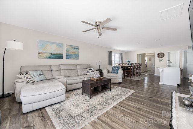 2754 Legacy Ridge Ln, Catawba, NC 28609 - living room with ceiling fan, dark wood-style flooring, and baseboards