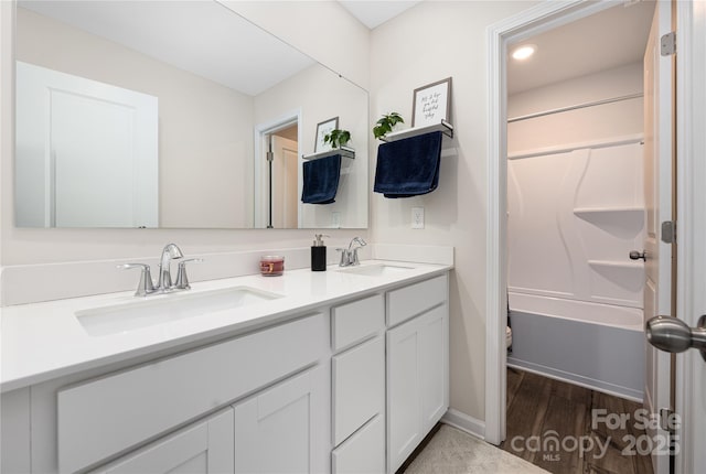 2754 Legacy Ridge Ln, Catawba, NC 28609 - full bath with double vanity, bathing tub / shower combination, wood finished floors, and toilet