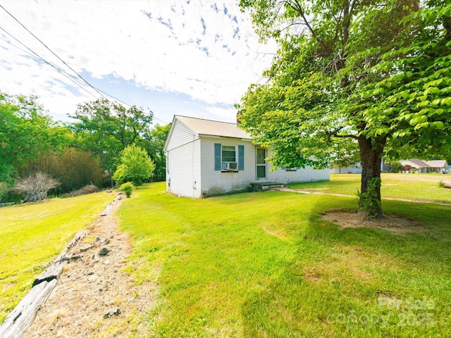 1470 Hilltop St, Albemarle, NC 28001 - view of home's exterior with a yard, metal roof, concrete block siding, and cooling unit