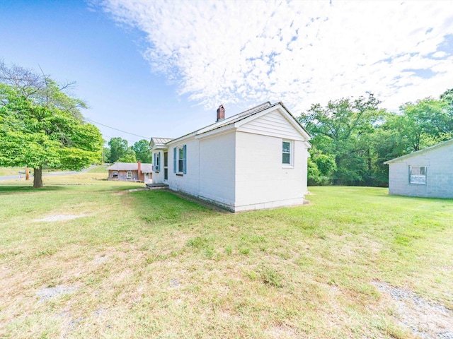 1470 Hilltop St, Albemarle, NC 28001 - view of side of property featuring a chimney and a yard