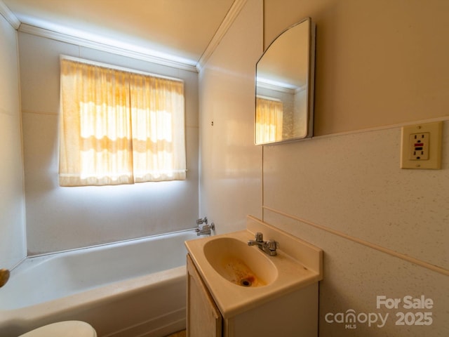 1470 Hilltop St, Albemarle, NC 28001 - bathroom with toilet, ornamental molding, vanity, and a tub to relax in