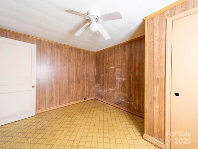 1470 Hilltop St, Albemarle, NC 28001 - unfurnished room featuring wooden walls and a ceiling fan