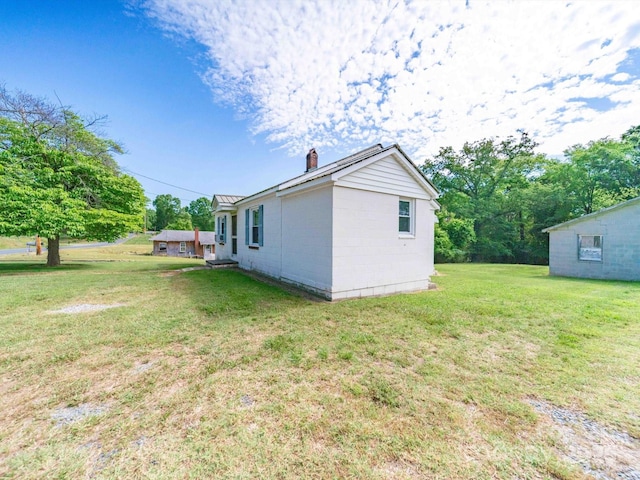 1470 Hilltop St, Albemarle, NC 28001 - exterior space with a yard and a chimney