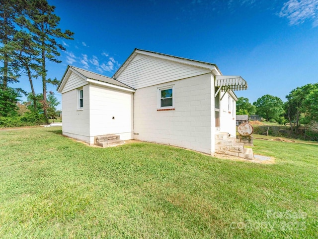 1470 Hilltop St, Albemarle, NC 28001 - rear view of property featuring a yard and concrete block siding