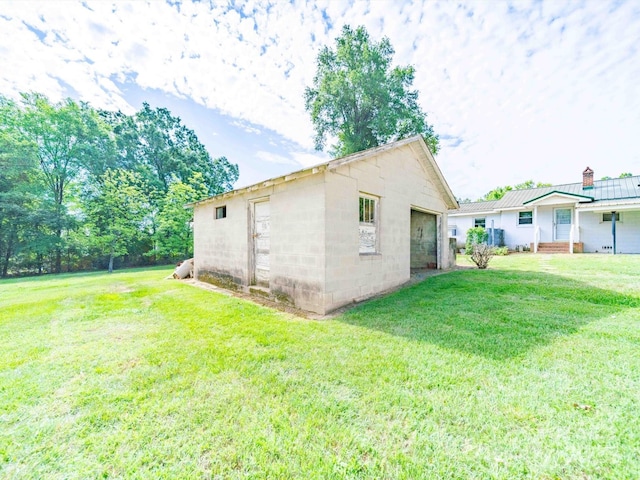 1470 Hilltop St, Albemarle, NC 28001 - view of home's exterior featuring a yard, an outdoor structure, and a chimney