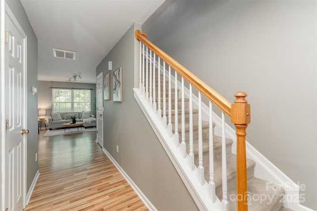 10421 Columbia Crest Ct, Charlotte, NC 28270 - stairway featuring wood finished floors and baseboards