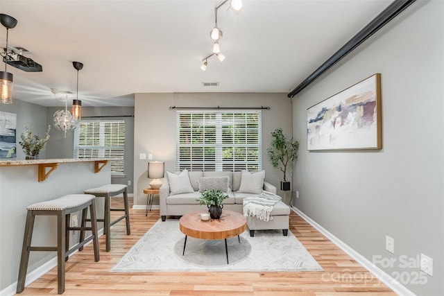 10421 Columbia Crest Ct, Charlotte, NC 28270 - living area with light wood finished floors and baseboards