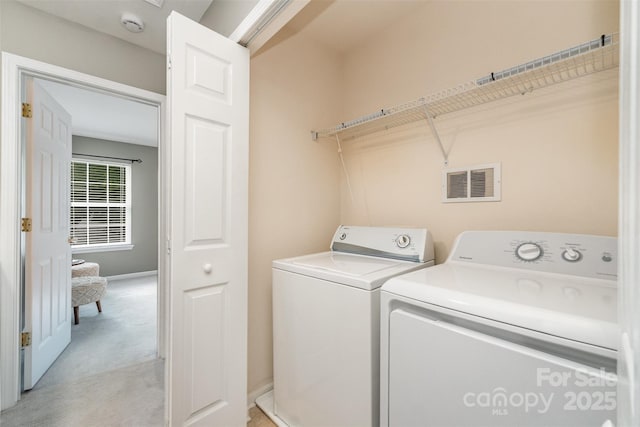 10421 Columbia Crest Ct, Charlotte, NC 28270 - washroom with washing machine and clothes dryer and light carpet