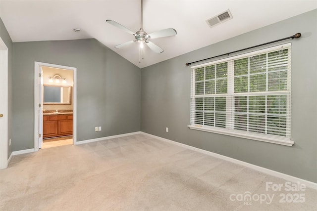 10421 Columbia Crest Ct, Charlotte, NC 28270 - unfurnished bedroom with light carpet, lofted ceiling, ensuite bath, and ceiling fan